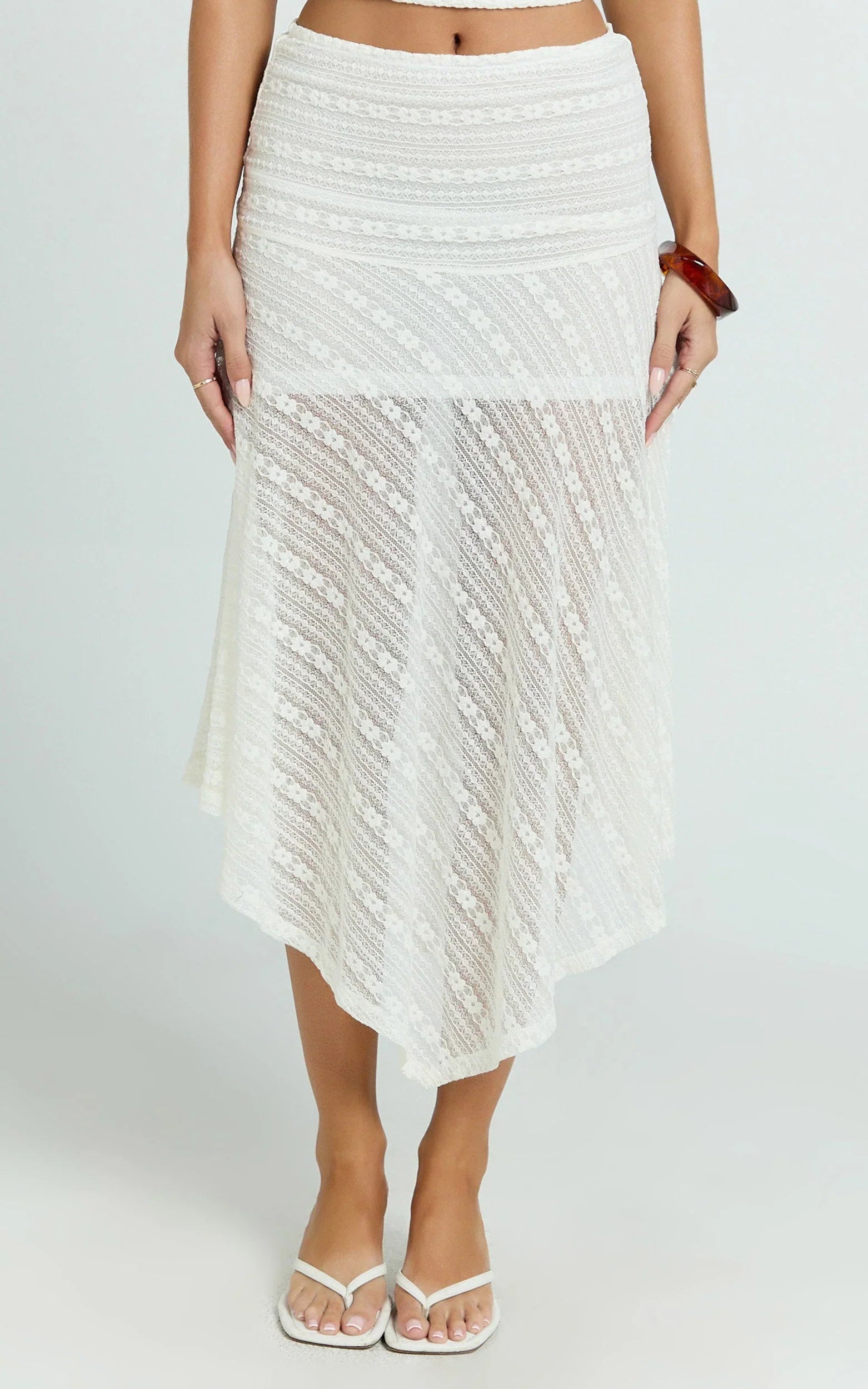 Hayden Midi Skirt - Low Waisted Asymmetrical Lace Midi Skirt in White