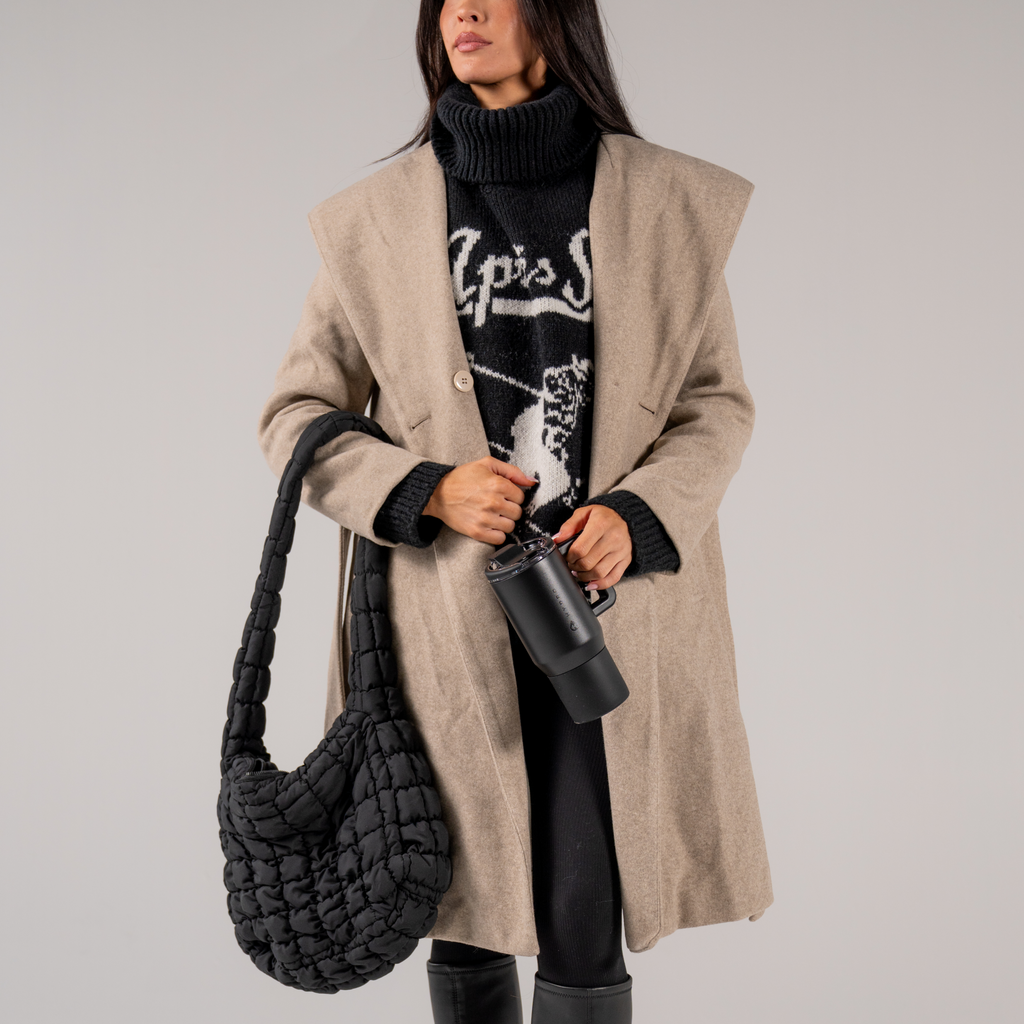 Woman Holding Black Coffee Traveler