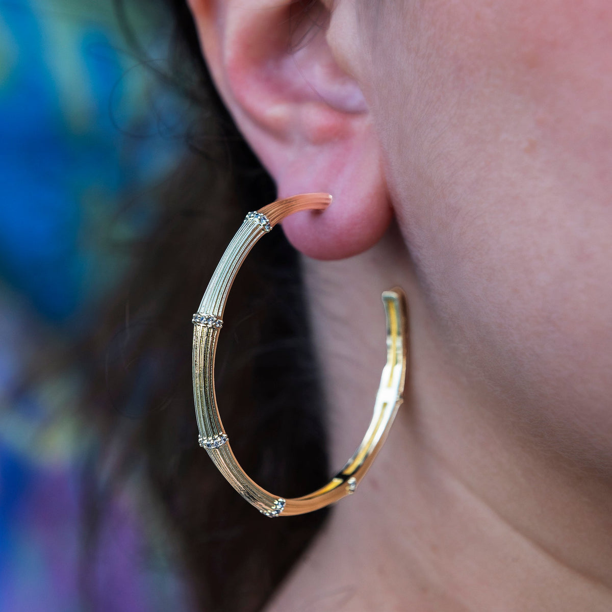 GLD Women Iced Textured Bamboo Hoop Earrings in Yellow Gold