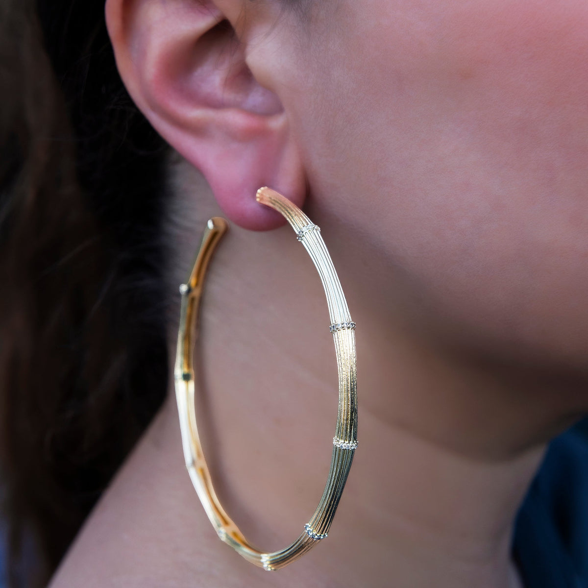GLD Women Iced Textured Bamboo Hoop Earrings in Yellow Gold