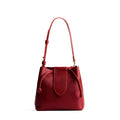 Chili Red*Small | Symmetrical leather bag with leather drawstring closure and adjustable shoulder strap